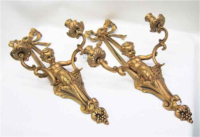 Appraisal: PAIR GILT METAL FIGURAL WALL CANDLE SCONCES Victorian style each