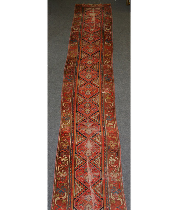 Appraisal: Vintage runner x Consistent wear to center of rug