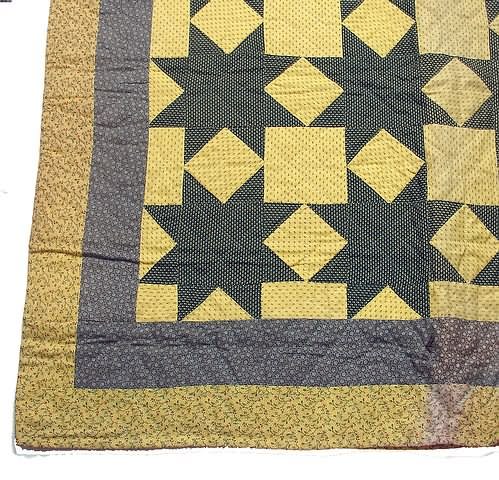 Appraisal: Quilt with green star design overall and yellow floral fabric