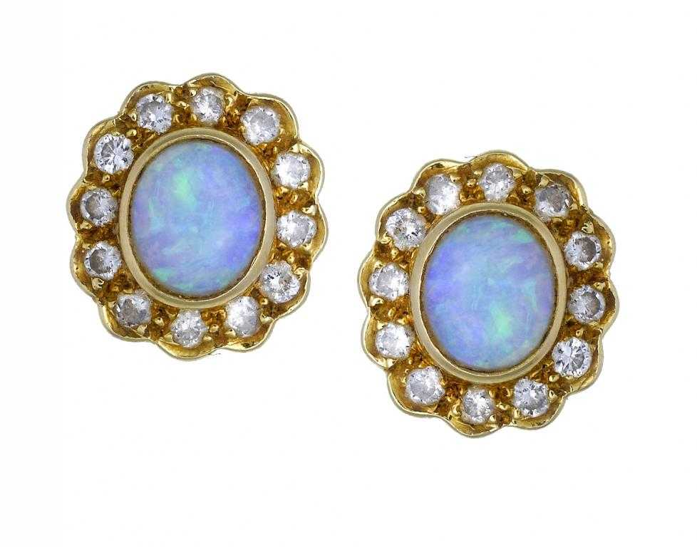 Appraisal: A PAIR OF OPAL AND DIAMOND CLUSTER STUD EARRINGS in