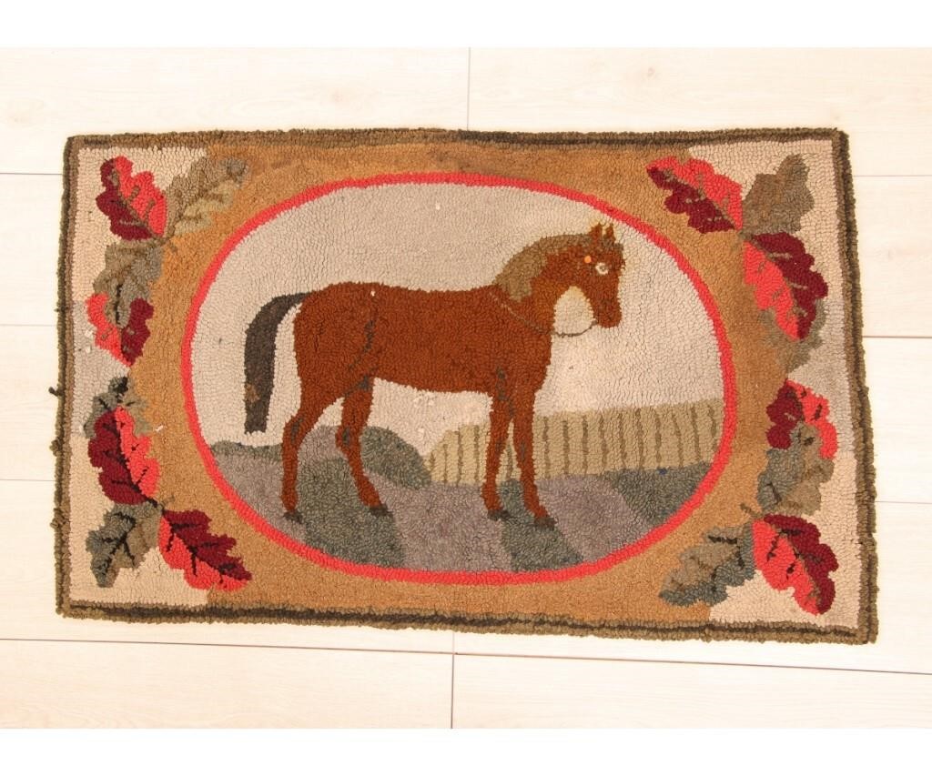 Appraisal: Colorful hooked rug of a standing horse circa surrounded by