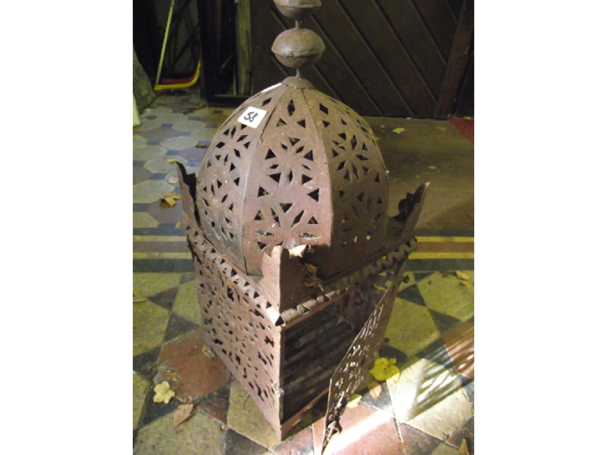 Appraisal: An Eastern hanging candle lantern of square cut and domed