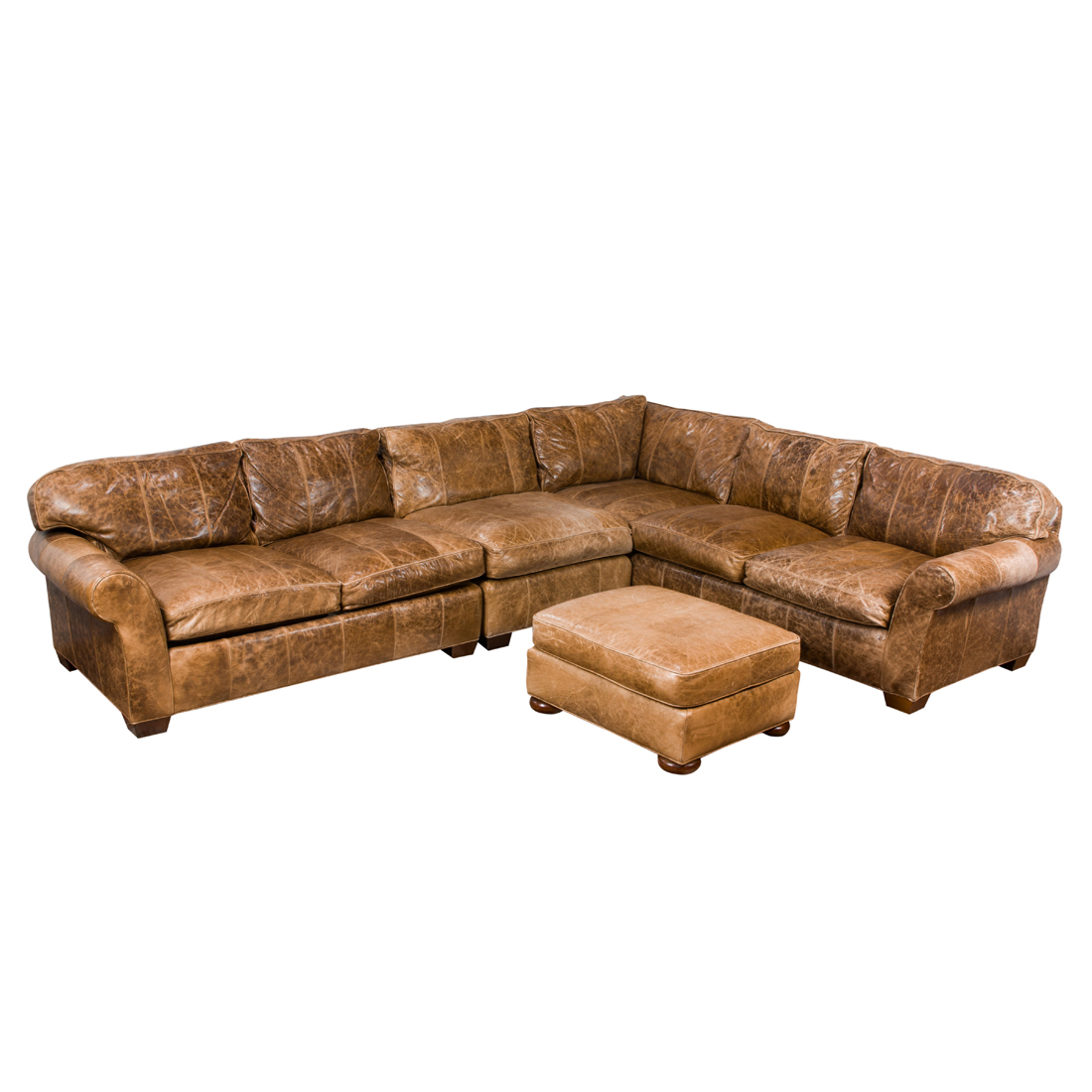 Appraisal: A CONTEMPORARY BROWN LEATHER SECTIONAL SOFA WITH OTTOMAN A Contemporary