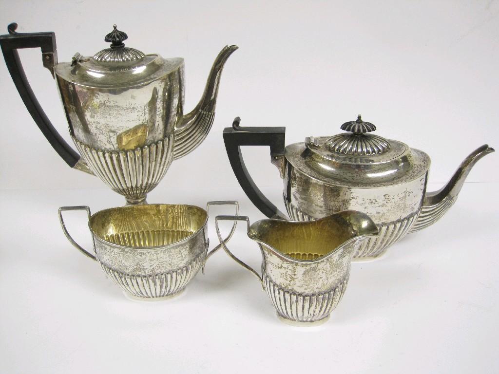 Appraisal: A George V three piece oval Tea Service of semi-fluted