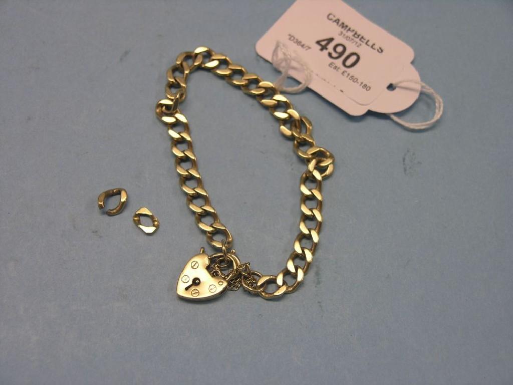 Appraisal: A ct gold curb-link bracelet with heart-shape padlock clasp grams