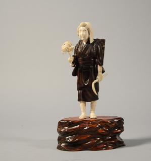 Appraisal: Japanese Meiji period bronze and ivory figure of woman with