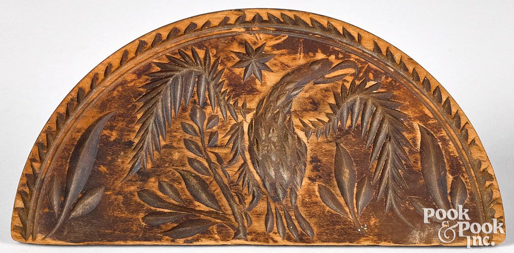 Appraisal: Incised pine half round eagle butterprint Deeply incised pine half