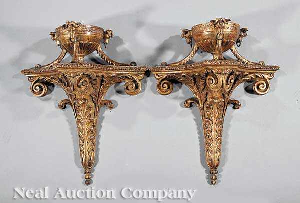 Appraisal: A Pair of Continental Carved Giltwood Wall Brackets lobed chalice