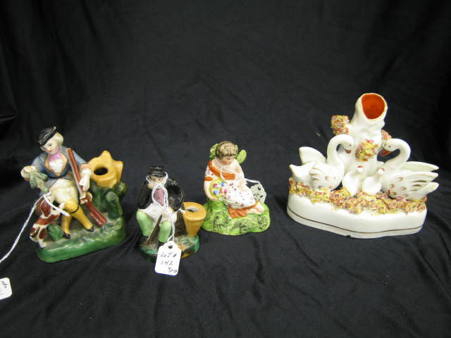 Appraisal: Staffordshire Figurines seated hunters swans child