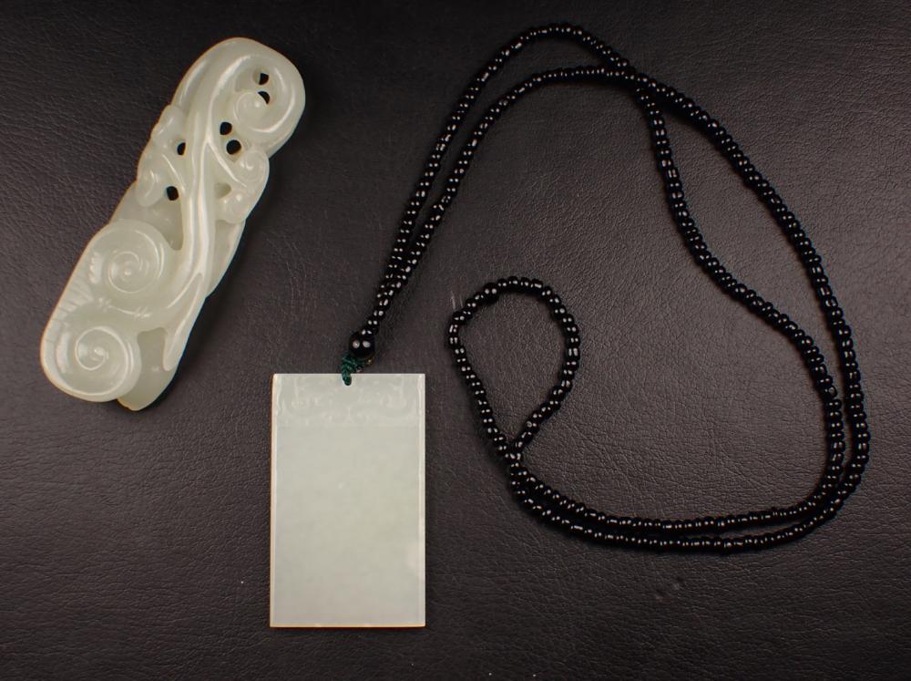 Appraisal: CHINESE CARVED WHITE JADE TOGGLE AND PENDANT NECKLACE The toggle