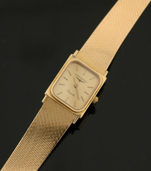 Appraisal: A Ladies Longines gold wristwatch Quartz square gilded dial with