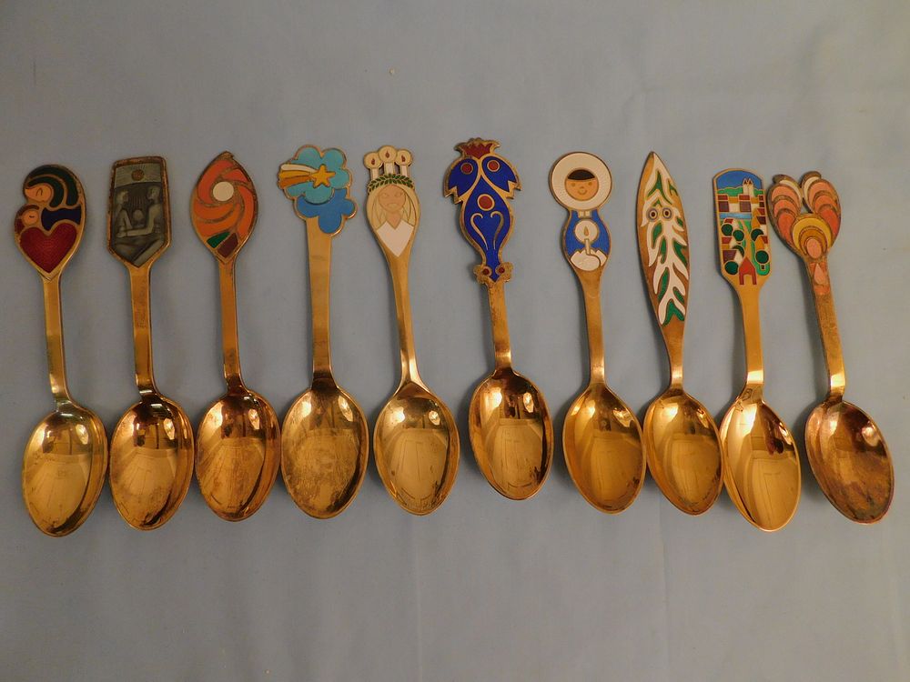 Appraisal: GILT SILVER ENAMEL SPOONS Set of gilt silver Scandanavian spoons