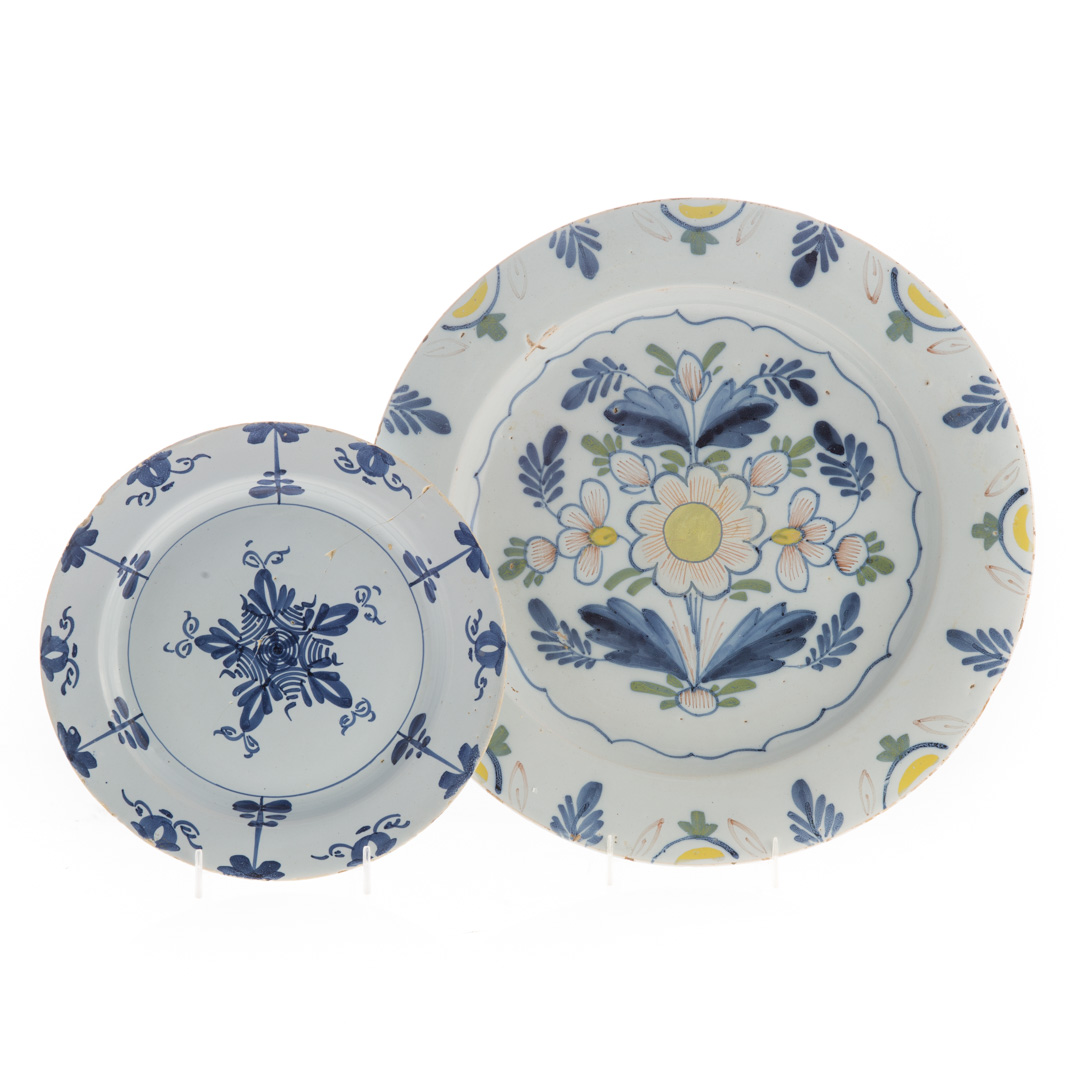 Appraisal: English Delftware charger and plate mid- th century Liverpool polychrome