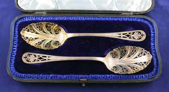 Appraisal: An Edwardian cased pair of fancy pierced and engraved silver