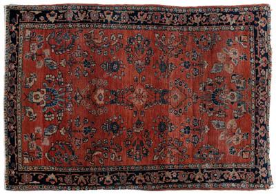 Appraisal: Sarouk rug floral designs on pale salmon field ft in