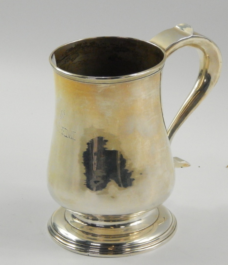 Appraisal: A George III provincial silver tankard of baluster form initial