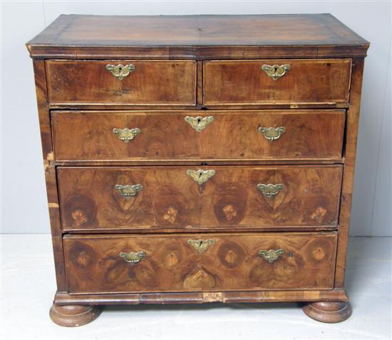 Appraisal: th century walnut and crossbanded chest of two short and