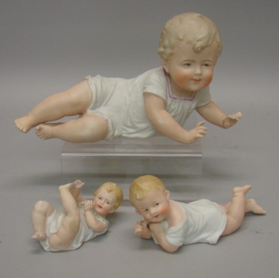 Appraisal: Lot of bisque piano babies Marked Heubach sunrise symbol babies