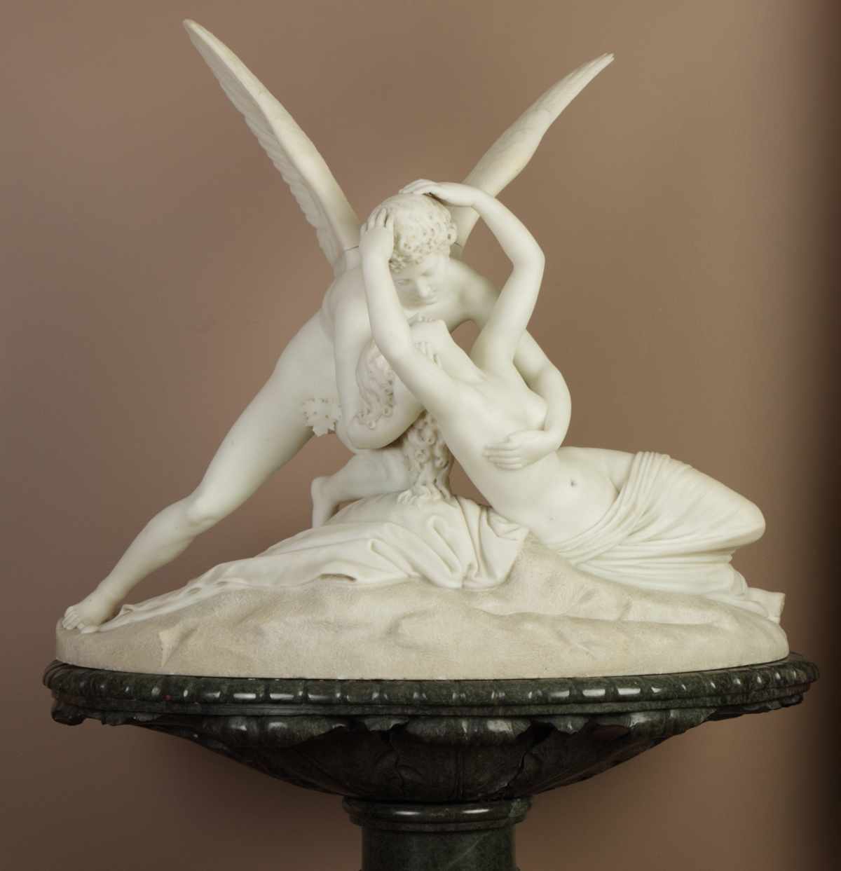 Appraisal: A Large Carved Marble Group of Cupid and Psyche on