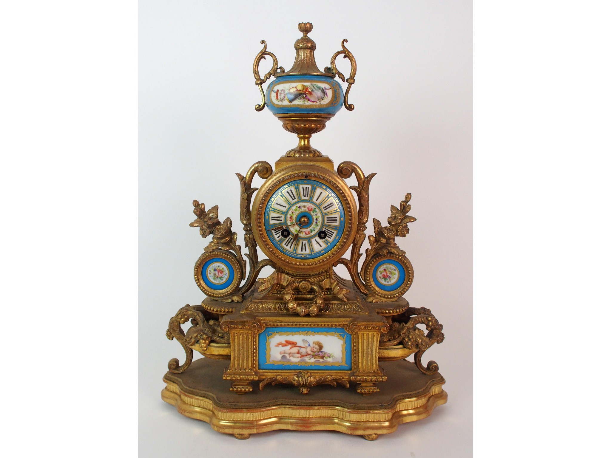 Appraisal: A French Sevres-style painted porcelain and gilt metal mantle clockclock