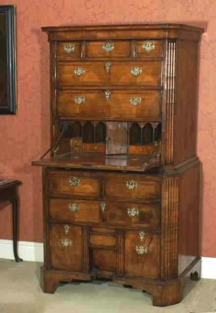 Appraisal: AN TH CENTURY WALNUT SECRETAIRE TALLBOY with cavetto cornice above