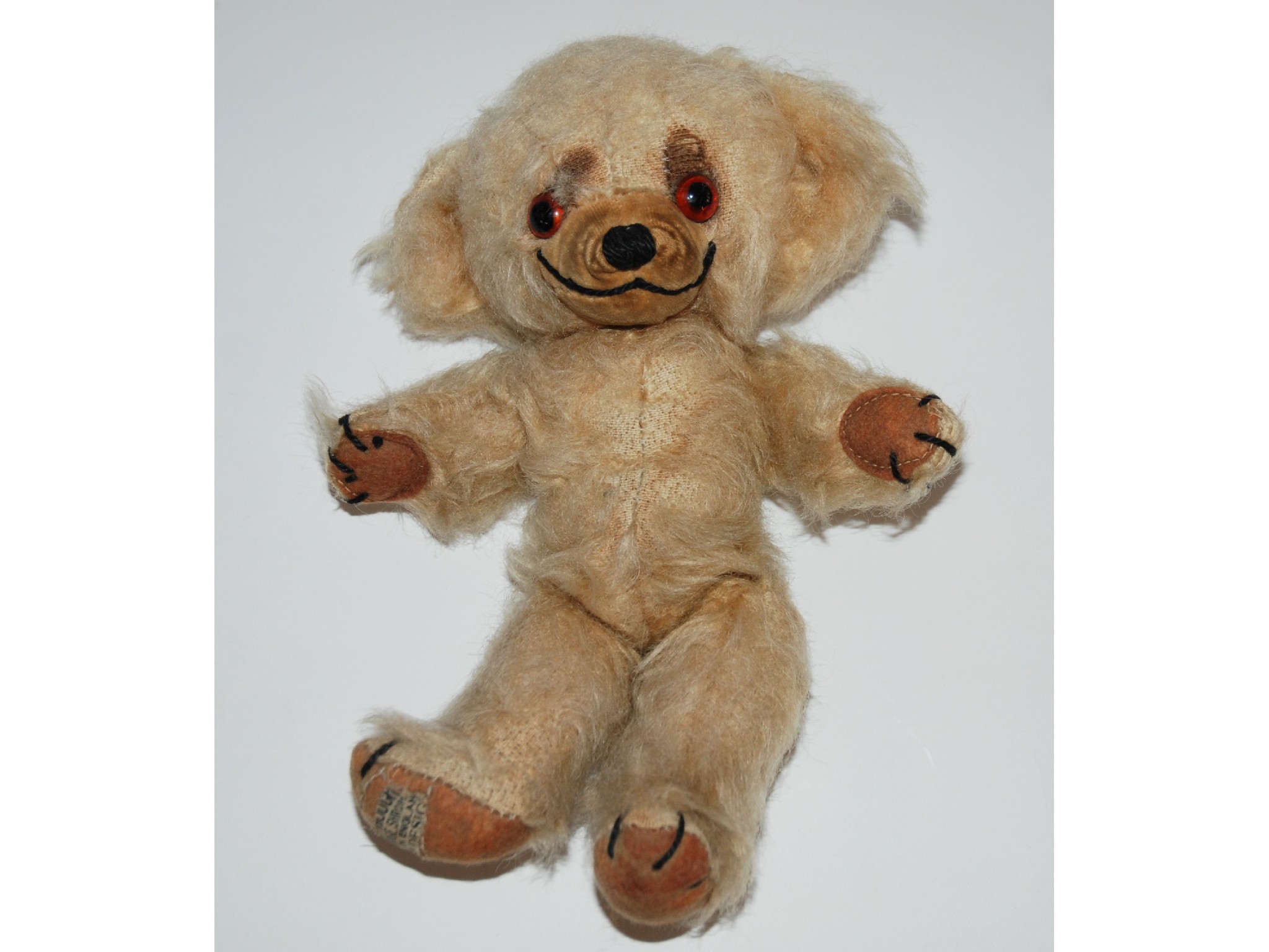 Appraisal: A Merrythought Cheeky Teddy Bearstitched nose and claws areas of