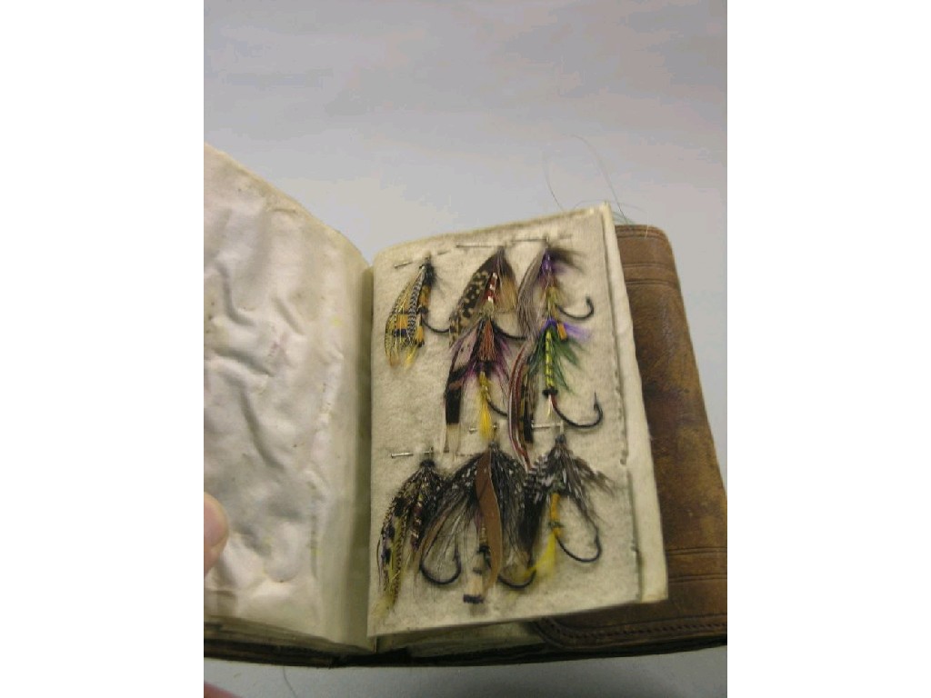 Appraisal: An early th century leather wallet containing a collection of