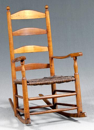 Appraisal: Ladder back rocking chair figured maple posts four-slat back oak