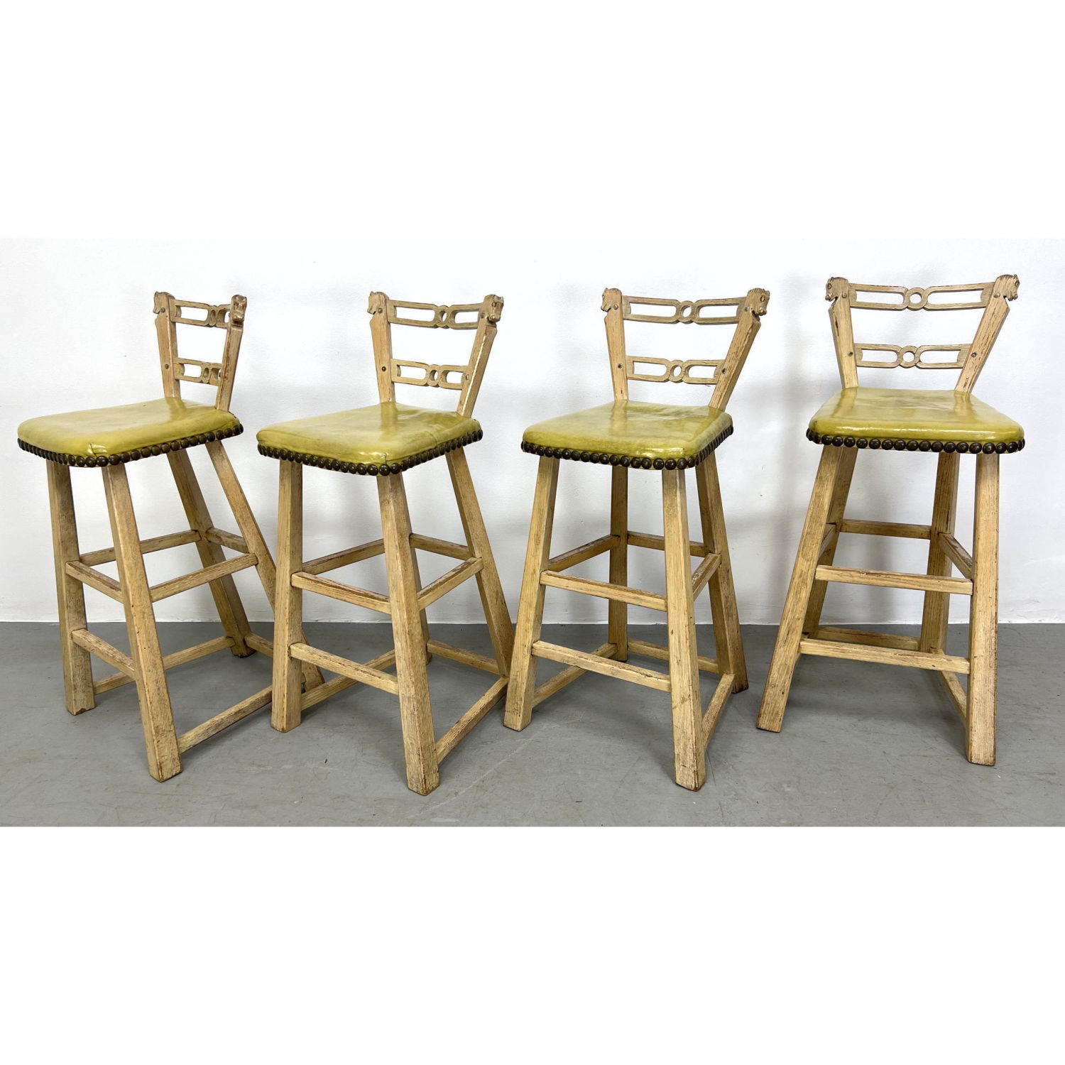 Appraisal: Western Theme Bar Stools Carved Wood Horse Head Finials Vinyl