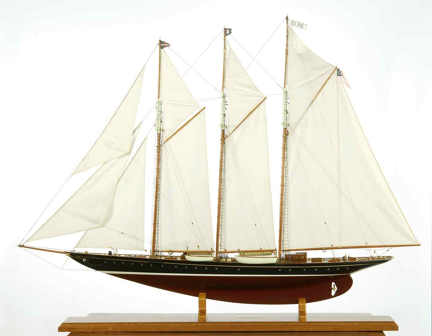 Appraisal: MODEL OF THE SCHOONER YACHT ATLANTICWith planked mahogany deck Height