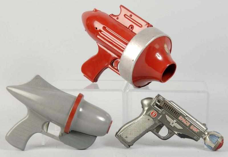 Appraisal: Lot of Vintage Metal Plastic Space Gun Toys Description American