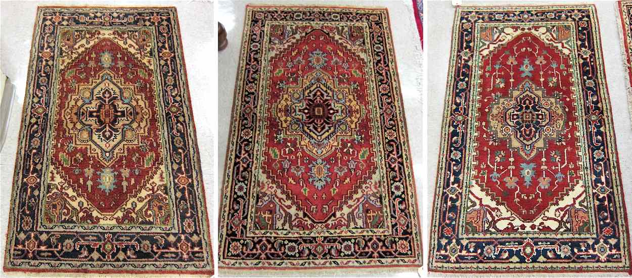 Appraisal: THREE ORIENTAL AREA RUG Persian Serapi design all hand knotted