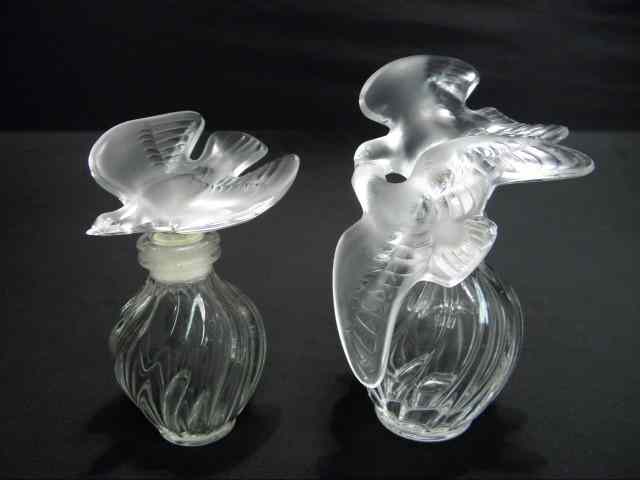 Appraisal: Two Lalique figural bird perfume bottles One larger and one