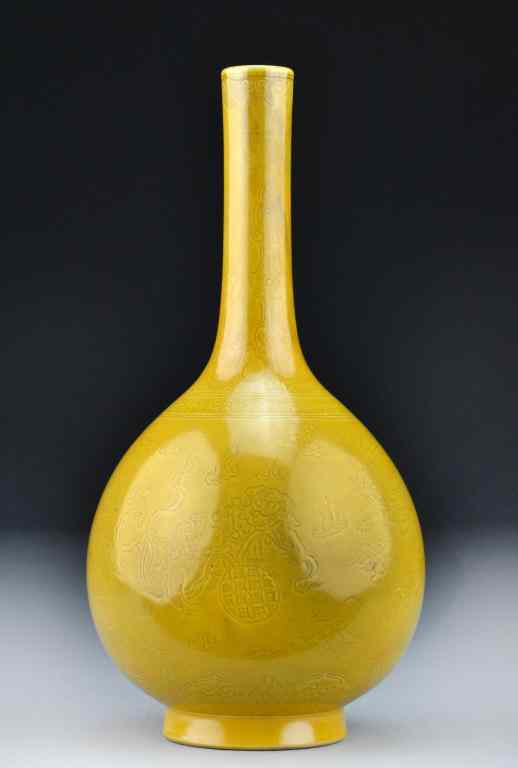 Appraisal: Chinese Mustard Yellow Porcelain VaseThe elongated bottle form mustard yellow