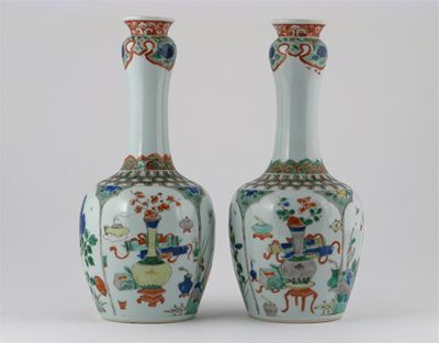 Appraisal: A pair of Chinese famille verte bottle vases brightly painted