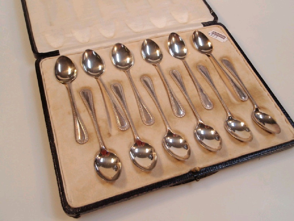 Appraisal: A set of twelve silver coffee spoons by Asprey Co