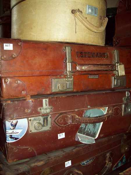 Appraisal: A COLLECTION OF SIX ANTIQUE LEATHER SUITCASES