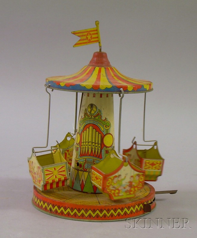 Appraisal: Lithographed Tin Wind-up Carousel Toy Wear scattered corrosion dents bends