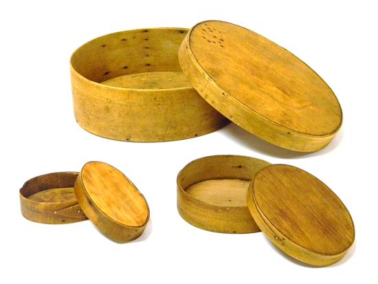 Appraisal: Three nesting pantry boxes oval frame with finger lap and