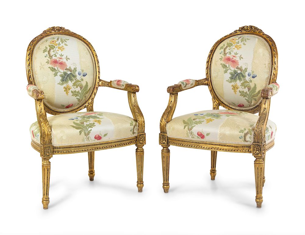 Appraisal: A Pair of Louis XVI Style Giltwood Fauteuils A Pair