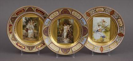 Appraisal: THREE VIENNA PORCELAIN CABINET PLATES Each with a rectangular scene