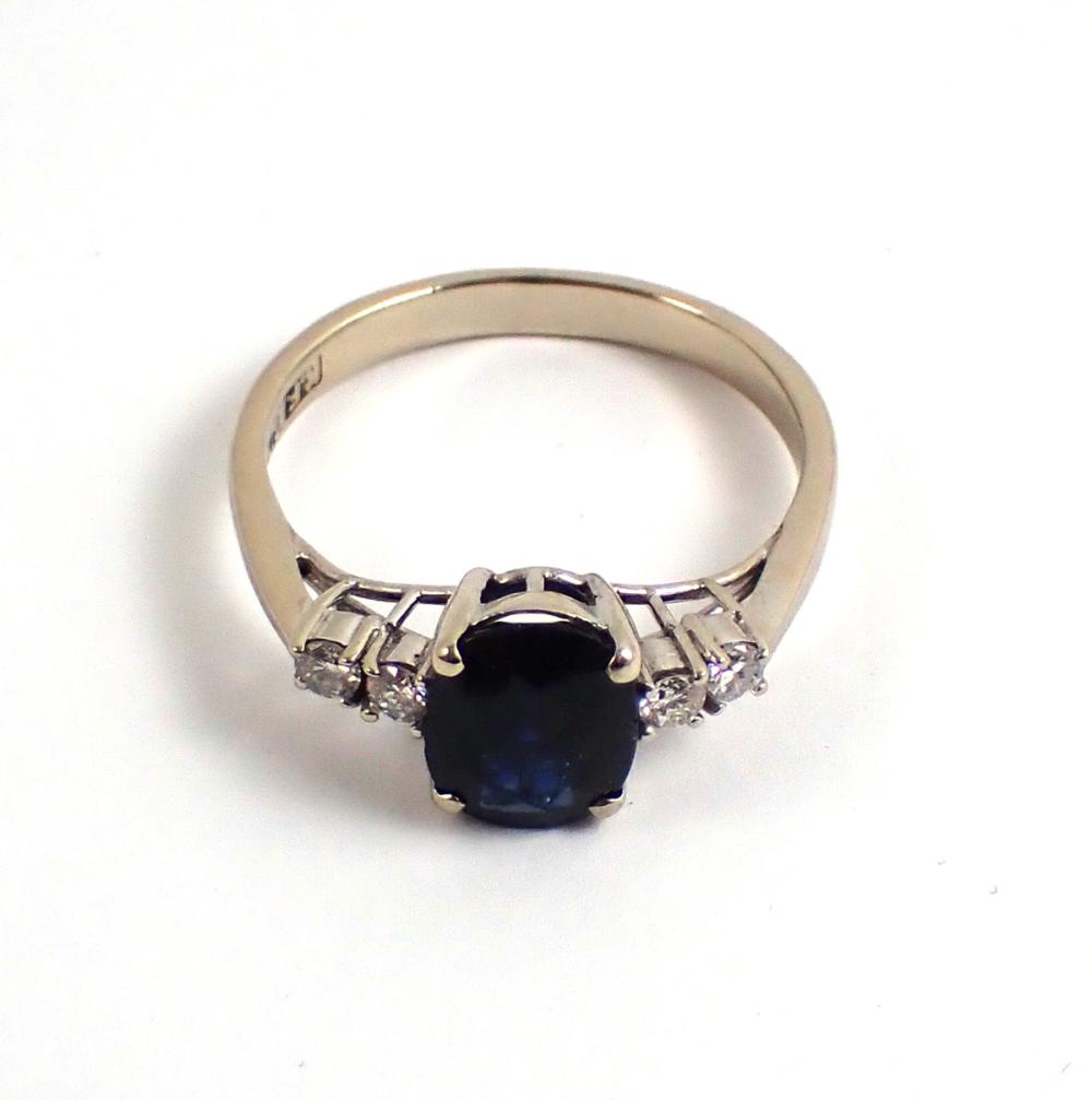 Appraisal: SAPPHIRE DIAMOND AND FOURTEEN KARAT GOLD RING The k white