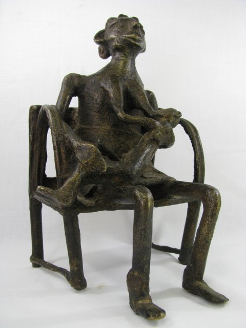 Appraisal: Mid twentieth century Benin bronze of a mother sitting down