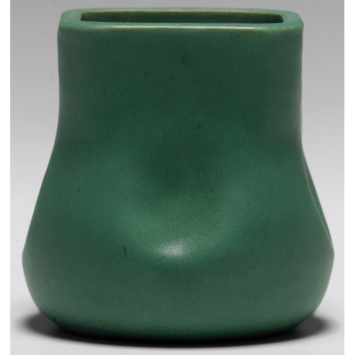 Appraisal: Teco vase designed by W Gates indented form covered in