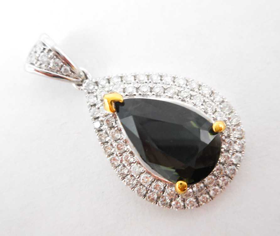 Appraisal: SAPPHIRE AND FOURTEEN KARAT GOLD PENDANT with AIGS Gem I