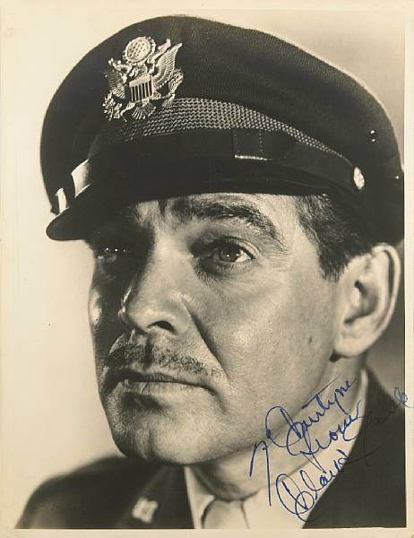 Appraisal: A Clark Gable signed black and white photograph s A