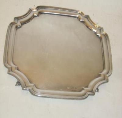 Appraisal: A SALVER maker's mark E V Sheffield stamped Sterling to