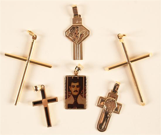 Appraisal: Assorted gold religious and portrait pendants grams