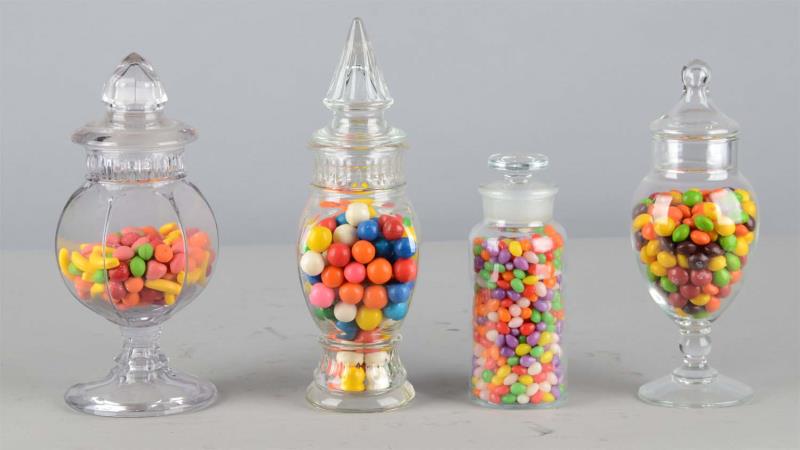 Appraisal: Lot Of Glass Countertop Candy Display Jars All jars are