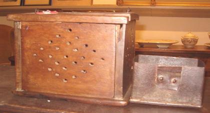 Appraisal: Oak Foot Warmer th c Having a handmade iron bail